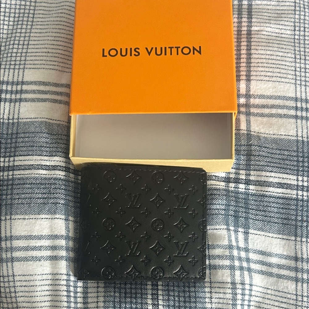 Louis Vuitton Black Embossed wallet